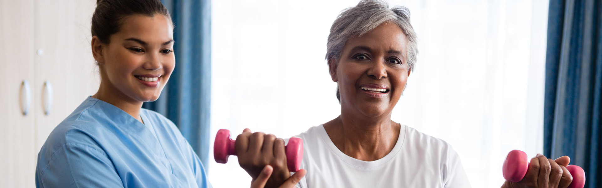 elderly woman lifting weights