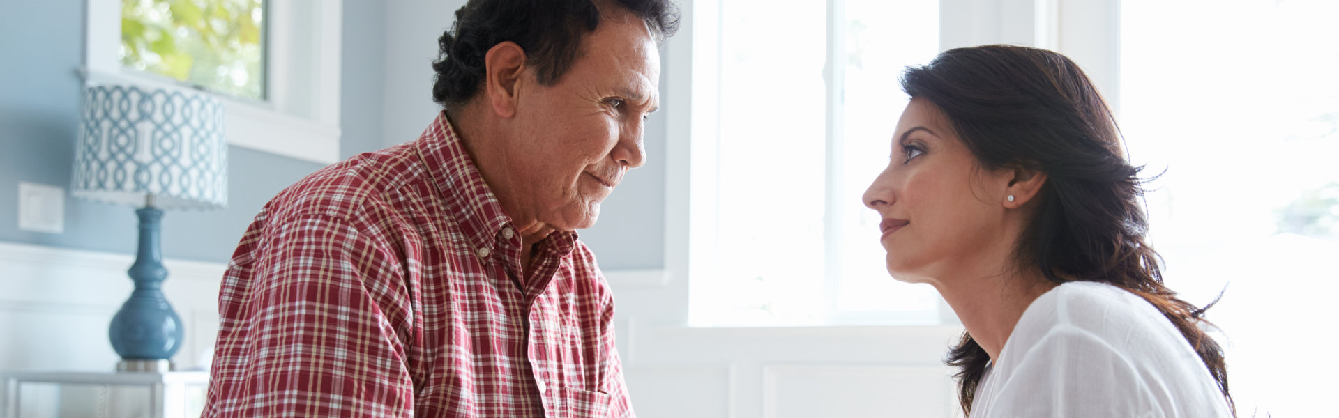 caretaker comfort the elderly man